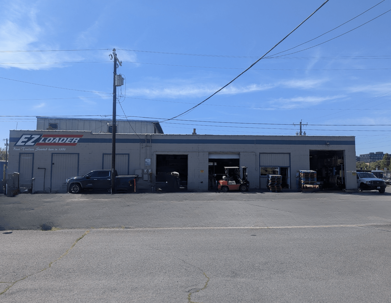 Exterior of Spokane Galvanizing facility with signage for shipping and receiving.